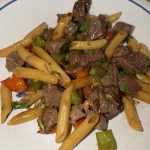 shaking beef with pasta